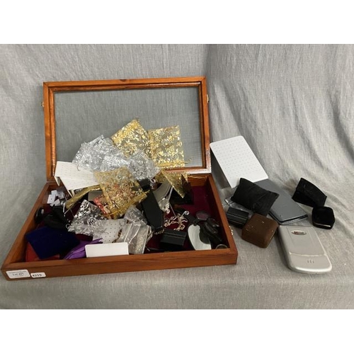 401 - Collectors/ jewellery display case, jewellery bags, earring stands, loops, etc. (case 44W 6H 27D)