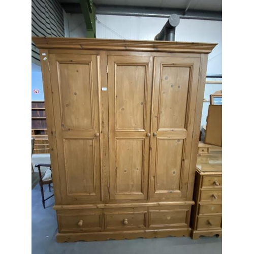 49 - Pine 3 door/3 drawer wardrobe with hanging rail and shelves to the interior 199H 154W 60D