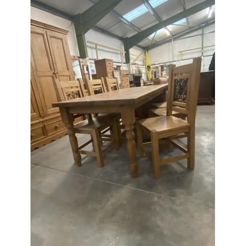 76 - Good quality pine farmhouse table 78H 184W 92D and 6 chairs