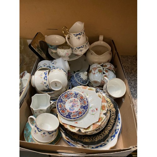 371 - 5 boxes of glassware, part tea sets, cased cutlery etc.