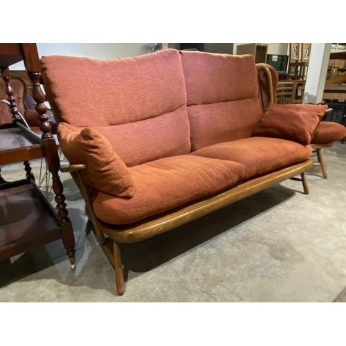 112 - Ercol elm settee upholstered in terracotta chenille fabric  180W