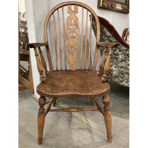 118 - Oak wheel back carver chair 55W