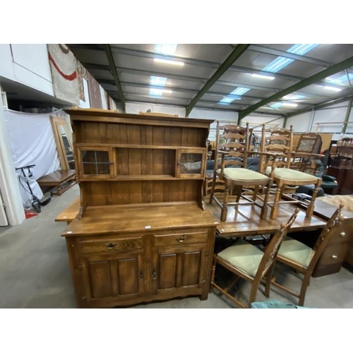 191 - Oak dresser 172H 121W 44D and an oak draw leaf table 76H 129W 84D and 6 ladder back chairs including... 