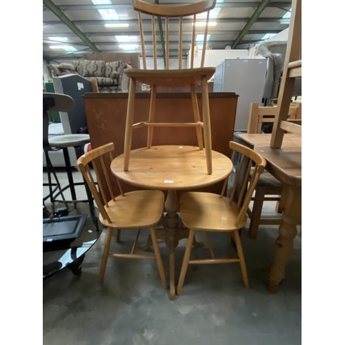 22 - Polish pine circular table with three chairs 75H 67W 67D