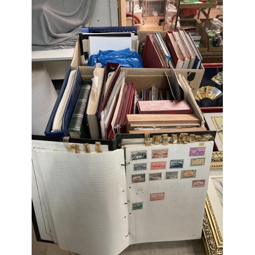 410 - 2 boxes of stamp albums, loose stamps etc.