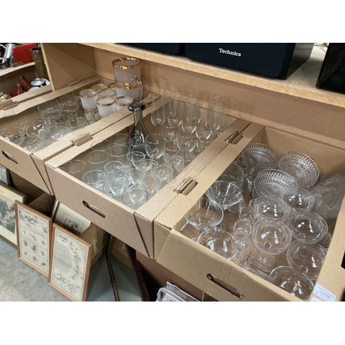 426 - 3 boxes of glassware inc. martini glasses, lemonade set, champagne glasses, sundae dishes etc.