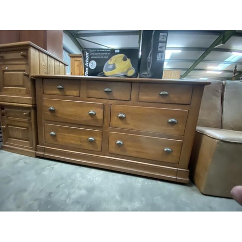 45 - Good quality oak 7 drawer chest 82H 150W 54D