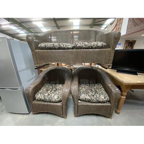 52 - Rattan conservatory suite with cushions. Sofa: 153W, 2 armchairs 87W