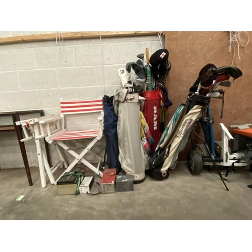 6 - 2 folding directors chairs, assorted golf bags and clubs including Browning, Yonex, Powacaddy golf t... 