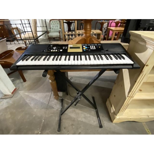 80 - Yamaha YPT-220 keyboard (no power lead, can be used with batteries) and a Stagg keyboard stand