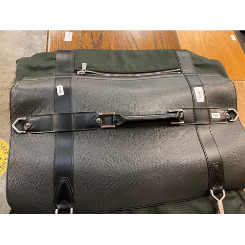 507 - Louis Vuitton Taiga Gibecier garment bag in black - please note damage to zip and wear to the bag