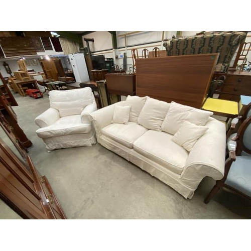 121 - Cream 2 piece suite (armchair 96W & settee 185W) with spare loose covers in mustard yellow and sage ... 