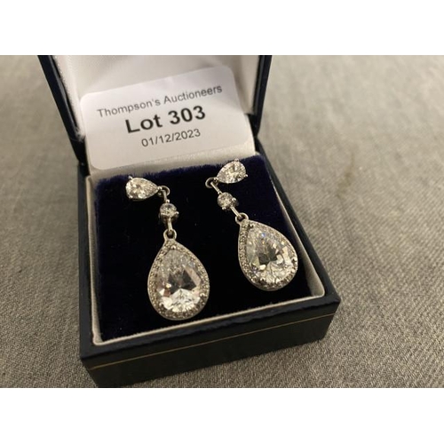 303 - Pair of silver drop earrings