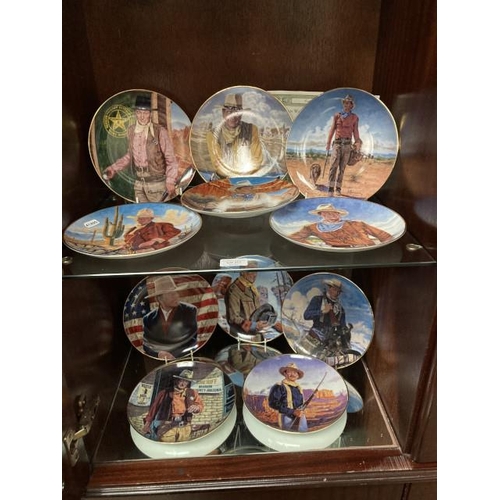 372 - 11 John Wayne by Franklin Mint collectors plates