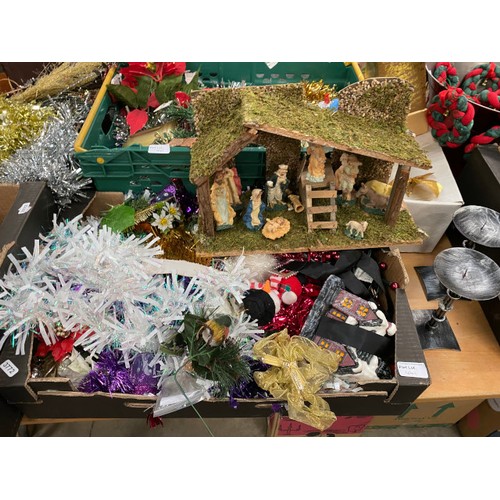 441 - 9 boxes of Christmas decorations including baubles, tinsel, wreaths ornaments etc, a nativity scene,... 