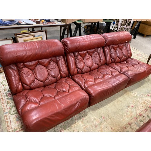 119 - 6 modular mid century red leather “Tetrad” individual chairs 78H 82W 100D (slight wear to the leathe... 