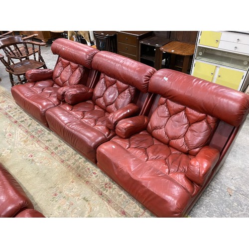 119 - 6 modular mid century red leather “Tetrad” individual chairs 78H 82W 100D (slight wear to the leathe... 