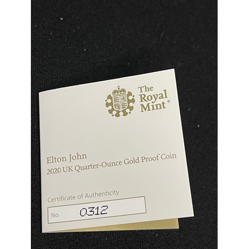 72 - “The Royal Mint” Elton John 2020 UK Quarter-Ounce Gold Proof Coin 
Denomination: £25
Issuing Authori... 