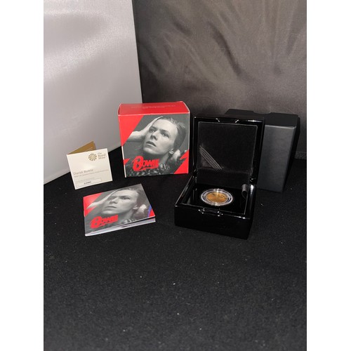 70 - “The Royal Mint” David Bowie 2020 UK Quarter-Ounce Gold Proof Coin 
Denomination: £25
Issuing Author... 