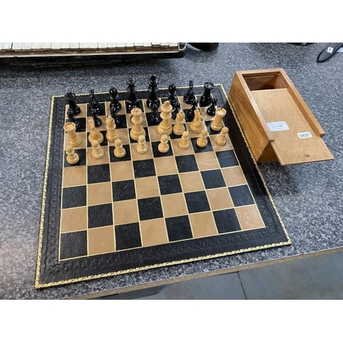 160 - Vintage wooden chess set on leather board