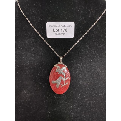 178 - Coral & silver oval pendant on silver chain