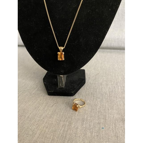 184 - 9ct gold & citrine pendant on 9ct gold chain 6.1g with 9ct gold & citrine set ring (size O) 4.3g