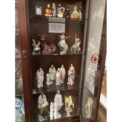 275 - 4 shelves of Japanese figurines, Chinese Foo dog, Tang Dynasty style horse, 8 Chinese god/ folklore ... 