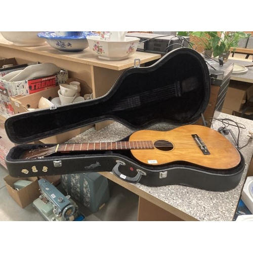 284 - Cased acoustic guitar (No makers labels/ marks)