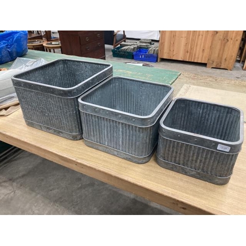 329 - 3 graduated galvanised square planters (28H x 41SQ, 24H x 36SQ, 20H x 30SQ)