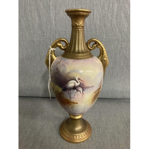 290 - Crown Devon A. Marsh twin handled urn decorated with Storks 27cm high