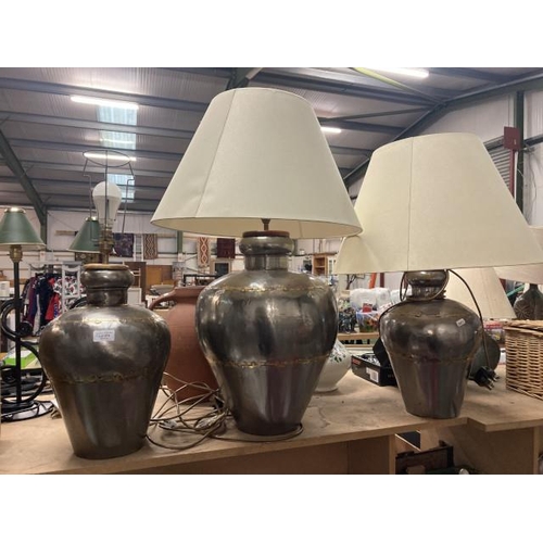 374 - 3 brushed steel table lamps in the style of Indian water vases 2 with shades (Pair at 63H & 80H)