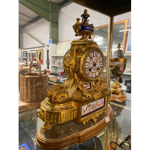 344 - French ormolu & porcelain mantle clock on stand with pendulum & key stamped 7639 & a pair of ormolu ... 