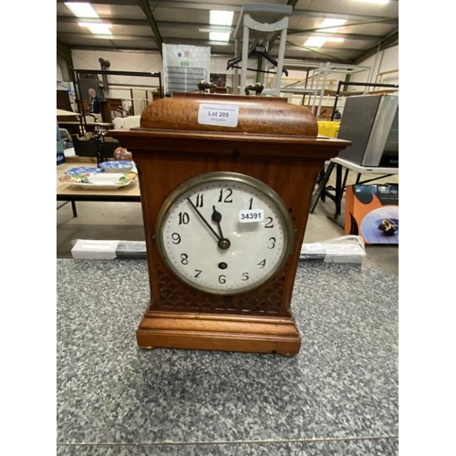 209 - Mahogany cased mantle clock with key (pendulum as seen)