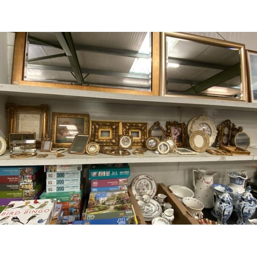 329 - Collection of mainly ornate gilt picture/mirror frames inc. ornate cream wall clock (various sizes)