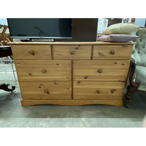 125 - Pine multi drawer chest 79H 131W 38D