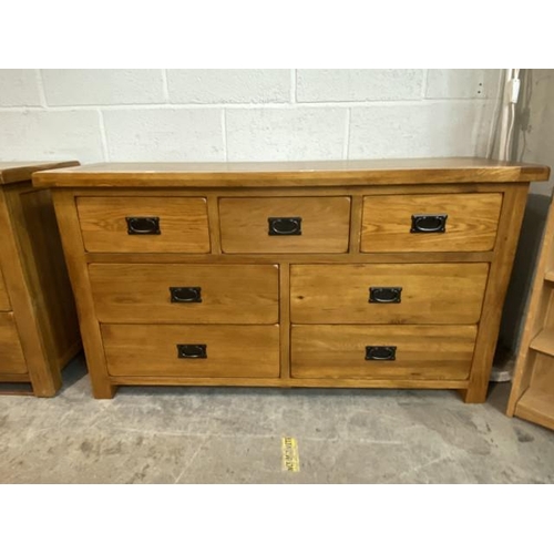 132 - Oak Furniture Land 7 drawer chest 77H 139W 43D