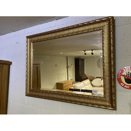 134 - Gilt framed bevel edged mirror 65 x 90cm