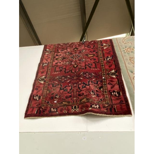 265 - Red ground Persian rug 125 x 200cm