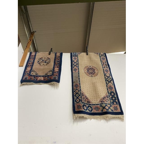 266 - 2 oriental rugs 62 x 98cm & 67 x 144cm