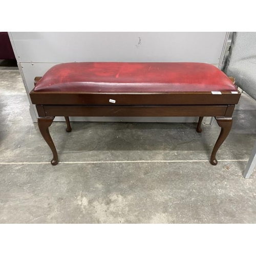 274 - Rise and fall piano stool with ox blood leather seat 48H 98W 34D