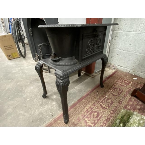 280 - Antique style French cast iron stove 64H 62W 36D