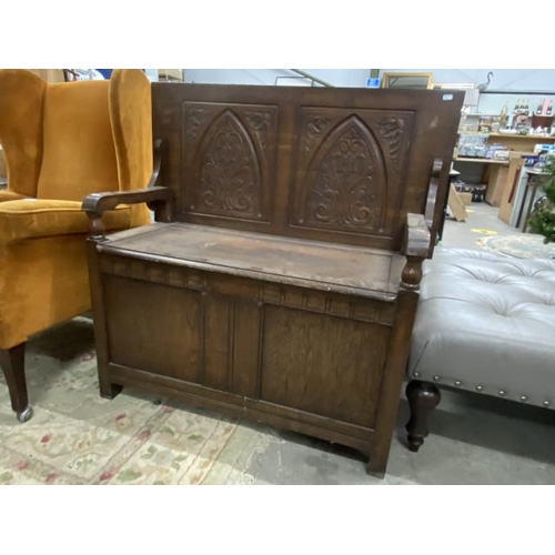 288 - Carved oak Monks bench 104H 106W 52D