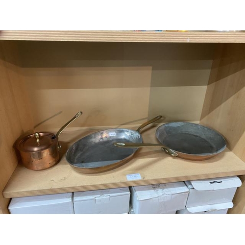 323 - Three copper pans with brass handles, one with lid