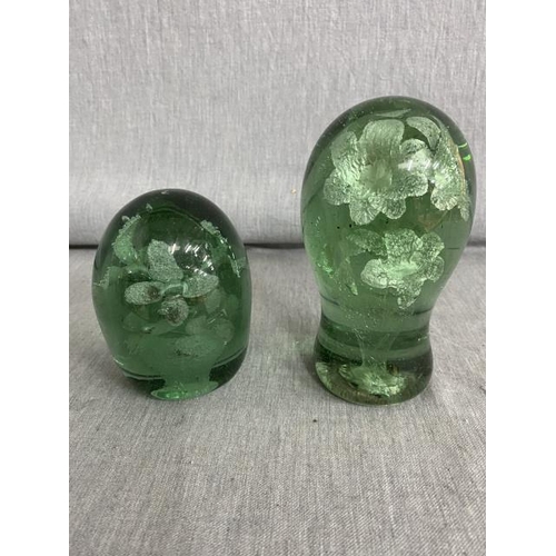 333 - 2 Victorian green glass dumps/paperweights with flower pot design 10cm & 11cmH