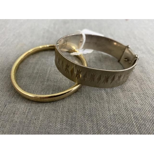 377 - Monomil Ltd, Birmingham silver bangle with safety chain 38g & vintage gilt bangle 12g