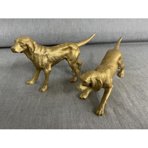 450 - Two gilt metal gun dogs