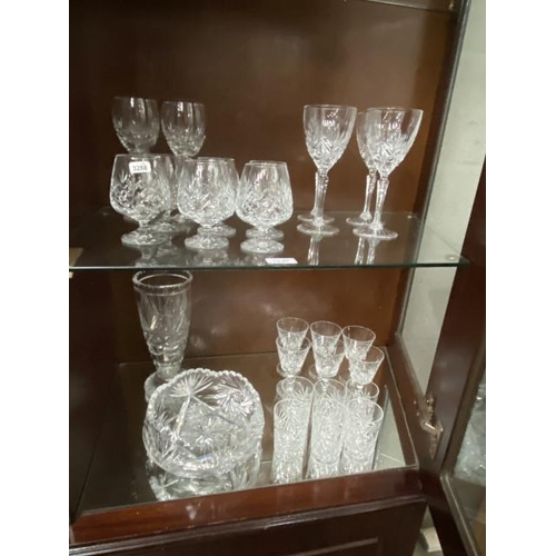 488 - 2 shelves of cut glass inc. set of 6 brandy glasses, set of 6 tumblers, set of 4 wine glasses, pair ... 