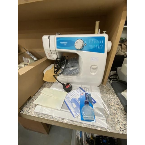 513 - Brother X-5 sewing machine with foot pedal, manual, DVD, oil & accessories