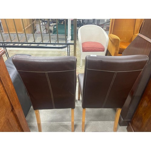 277 - 4 brown leather dining chairs