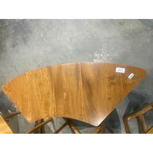 149 - Mid century Supper Table by Lucian Ercolani (Ercol) comprising 4 ‘Model 515’ crescent shaped outer t... 